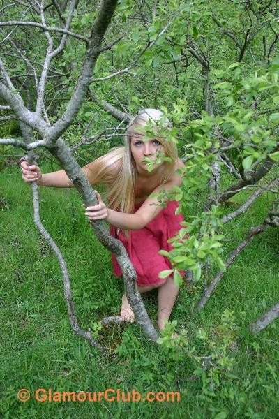 Oksana G peeking through the branches
